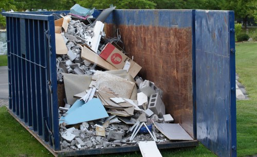 People decluttering their home for disposal